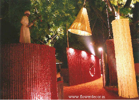 Roses and Rajnigandha strings for the wooden Gate